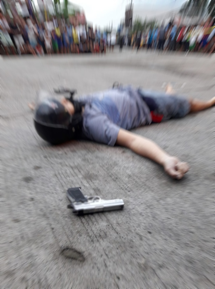 VILLAGE COUNCILOR DIES IN AMBUSH TURNED SHOOT-OUT; ONE ATTACKER KILLED, ANOTHER ONE WOUNDED
