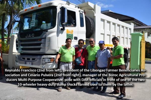 DAR Gives Away 2 Dump Trucks