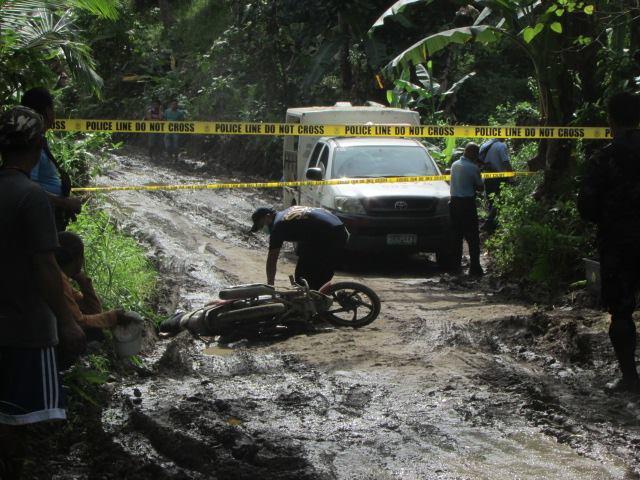 Village Chief, Aide; Shot to Death